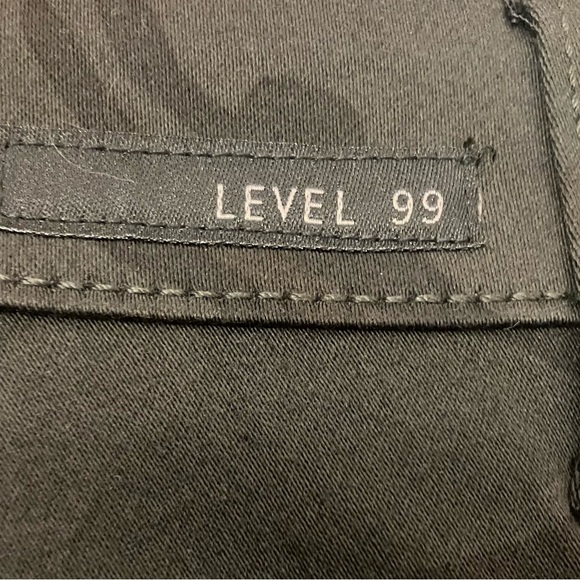 LEVEL 99 Size 26, straight boot cut, dark camouflage  w/gold pinstripe down side - Picture 9 of 9